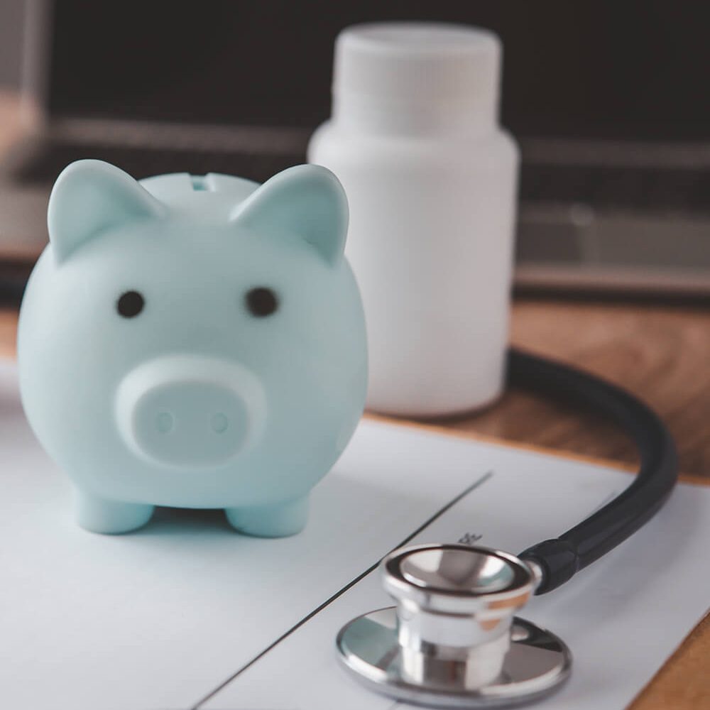 medical-insurance-concept-with-piggy-bank-and-stet-2022-11-19-05-49-50-utc